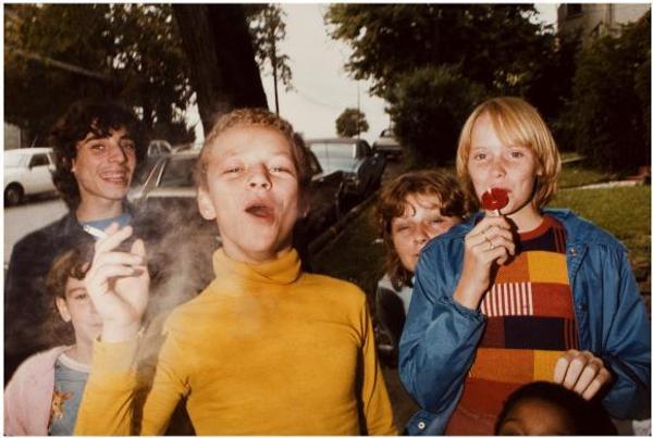 Mark Cohen (b.  1943) Boy in Yellow Shirt Smoking, 1977.  Dye coupler print © Mark Cohen Courtesy the artist and ROSEGALLERY