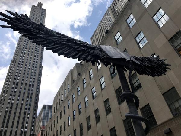 Installed at NYC's Rockefeller Center Channel Gardens in 2018 was the sculpture by Anselm Kiefer titled Uraeus, 2017-2018 (detail shown), lead, stainless steel, fiberglass, and resin 298 1/8 x 441 x 346 1/2 inches.  