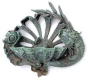  Lot 100 : A Rococo Revival Bronze Wall Mounted Fountain, 20th Century, with stylized dolphin shell and frog motif.  h:35 w:34 d:13.75 in.  Estimate $ 3,000-5,000