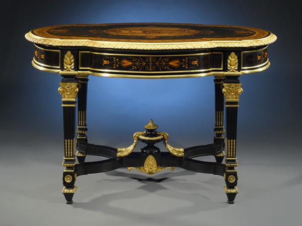 Outstanding craftsmanship informs this center table by Charles-Guillaume Diehl