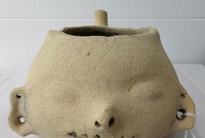 Prehistoric clay pot effigy of a human head, discovered in the Southeastern United States, 6.5 inches tall (est.  $1,000-$3,000).