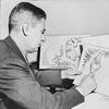 Theodor Seuss Geisel, "Dr.  Seuss," at work in 1957.