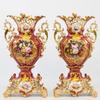 Magnificent pair of early 19th century Old Paris vases, museum deaccessioned 50 years ago, with lattice work from top to bottom and breathtaking painting, like new (estimate: $5,000-$15,000).