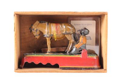 “Always Did ‘Spise a Mule” (Lot 262), mechanical bank, circa 1879m J & E Stevens, in excellent original condition with original paint, rare original box and paper.