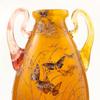 A remarkable, early Galle vase enameled with butterflies found in a Florida private collection.