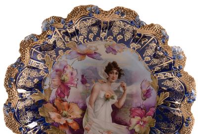 Marked R.S.  Prussia plate, 11.75 inches in diameter, stipple mold, with a fall season portrait decor having poppy highlights and a wonderful cobalt blue border.