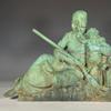 One of two bronze statues with green verdigris patina signed by Frederick William MacMonnies (American, 1863-1937), this one titled Pioneer Mother ($27,060).  