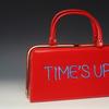 Michele Pred, Power of the Purse: Time's Up/ Equal Pay , 2018, vintage purse with electroluminescent wire, 11 x 12 x 4 inches