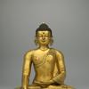 Buddha Shakyamuni, 14th century.  Northwestern Nepal (Khasa Malla Kingdom).  Gilt copper alloy with turquoise inlay.