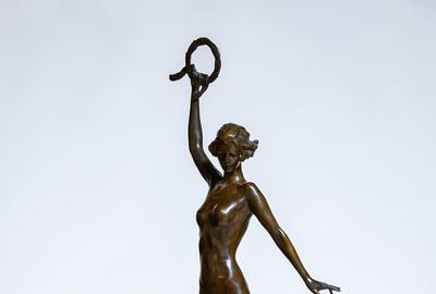 Bronze sculpture by Janet Scudder (American, 1873-1940), titled Victory, signed, 31 ½ inches tall.  Estimate: $15,000-$25,000.