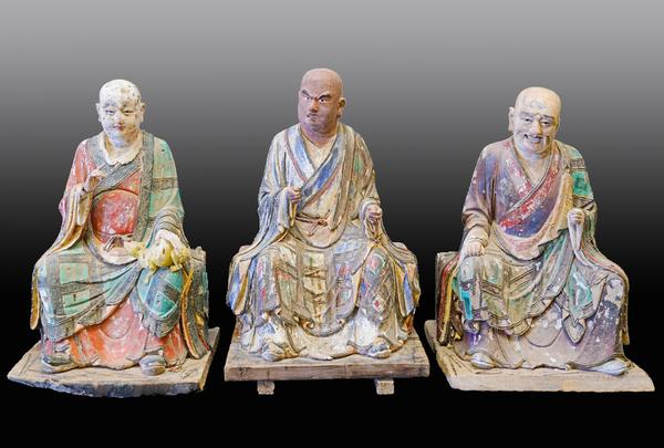 Set of Three Chinese Polychrome Stucco Lohans, Song/Yuan Dynasty Height of each: 24 inches(61cm) 