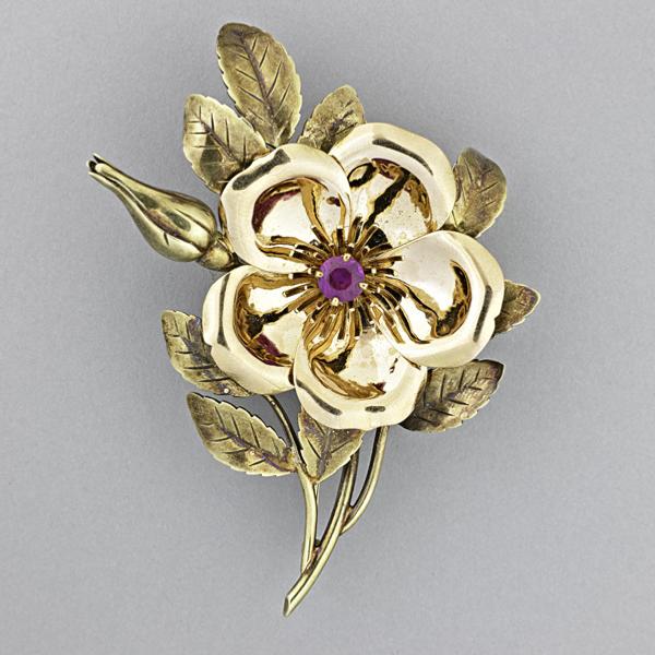 Tiffany & Co.  Bicolor Gold Ruby Brooch, $2,000-3,000