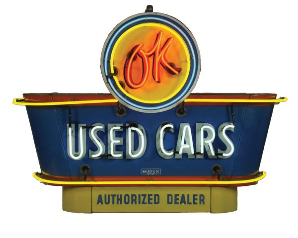 Outstanding OK Used Cars double-sided neon porcelain dealership sign with original bullnose attachments, 56 x 40 x 18in.  Estimate $14,000-$20,000