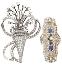 These two platinum, gold and diamond brooches ($1/1,500) will cross the block.