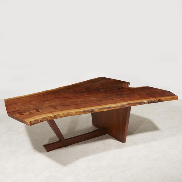 GEORGE NAKASHIMA (AMERICAN, 1905-1990) THE IMPORTANT HOLTZ DINING TABLE, NEW HOPE, PENNSYLVANIA, 1986 Claro Walnut, American Black Walnut, rosewood.  H: 29, L: 92, W: 65 in.  Estimate $150,000-250,000 