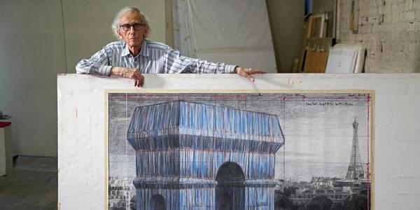 Christo in his studio with a preparatory drawing for "L'Arc de Triomphe, Wrapped." New York City, September 20, 2019.  Photo: Wolfgang Volz © 2019 Christo and Jeanne-Claude Foundation