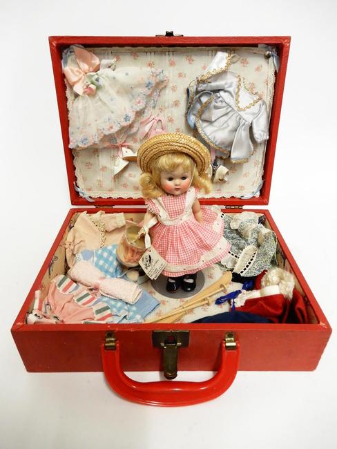 1952 Vogue Ginny ‘Rich Uncle’ special trunk set including Ginny doll with hang tag, numerous original factory outfits and accessories.  Near-mint.  Estimate $800-$1,200