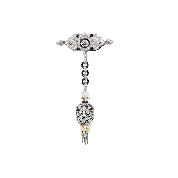 Lot 1427: Cartier Pinecone Diamond Platinum Shoulder Brooch, $40,000-60,000