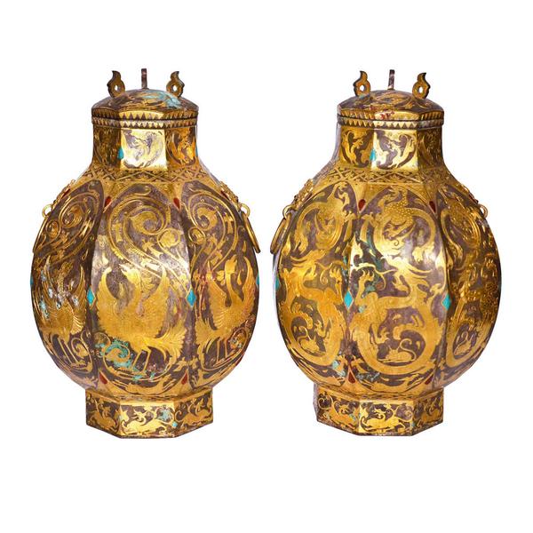 Diamond chips, gold, turquoise and agate decorate this pair of Tang Dynasty vessels, or Zun.  Gianguan Auctions Lot 172.  $800,000-$1,500,000.  