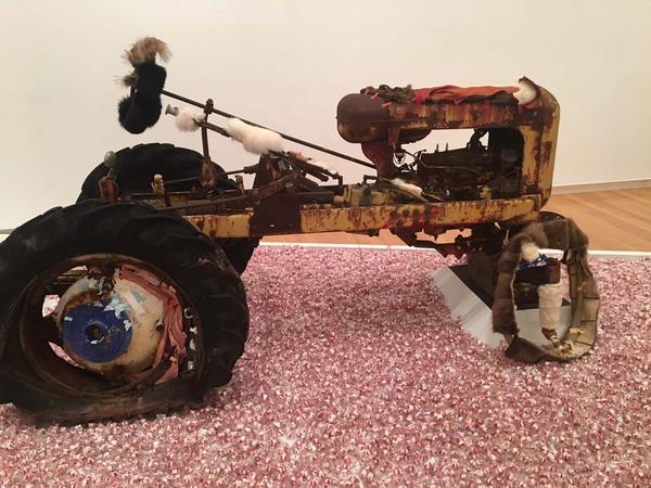 It opened with the melancholy reflection that, in the lives of mortals, the best days are the first to flee.  Vintage General GG tractor, fur, paper, acrylic, oil, 72x120x54 inches, Installation at Goucher College, Baltimore, MD, 2018