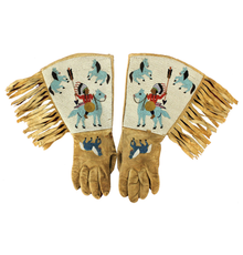 Turn-of-the-century Native American (Plateau) gauntlets, fully beaded with images of multiple figures, including Indian chiefs and horses.  Cuffs adorned with long fringe.  Estimate $4,500-$7,500