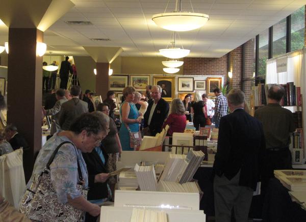 Visitors enjoy St.  Louis Fine Print, Rare Book & Paper Arts Fair, May 2012.