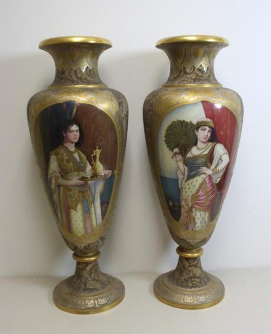 Lot 203 is the magnificent pair of artist signed vases 