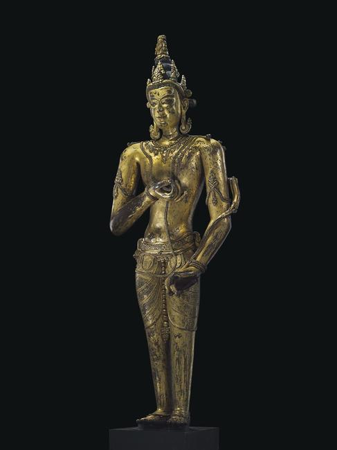 An important and large gilt bronze figure of bodhisattva Tibet, 9th/10th century 43 ¼ in.  (110 cm.) high Estimate upon request 