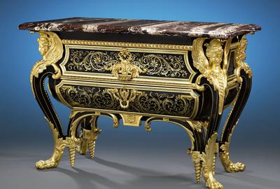 Henry Dasson based this commode upon the famous pair Boulle created for Louis XIV.  