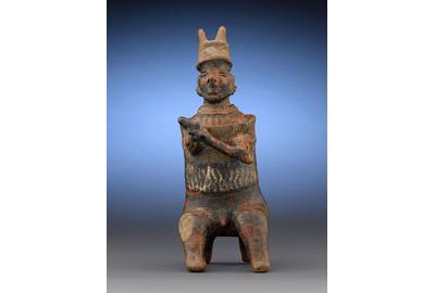 This incredible Nayarit Warrior Figure represents a highly respected chieftain, as indicated by the horns, staff and seated posture.  