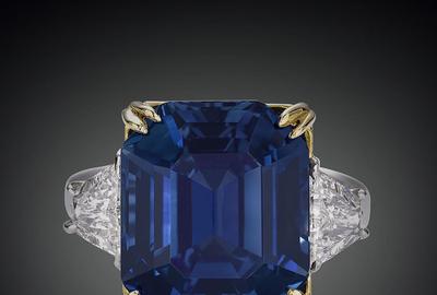 Immense rarity and beauty define this awe-inspiring untreated 18.50-carat Kashmir sapphire.  This emerald-cut natural wonder is accompanied by 1.30 carats of diamonds and set in platinum and 22K yellow gold.