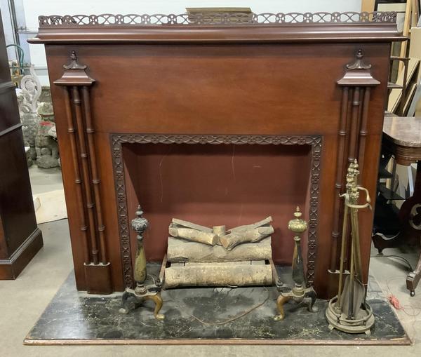 This RCA Victor fireplace radio ($500-1,500) comes with a set of fireplace tools and accessories.  It measures 50 by 60 by 25 inches.