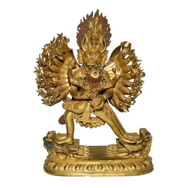 Lot, 213 is a 35-arm Tibetan gilt bronze deity in the form of Vajrabhairava Yamantaka with Consort.  The multiple arms used for fighting off cosmic forces are comprised of moveable parts.  It is of the Qing Dynasty, 9 1/2 inches tall.