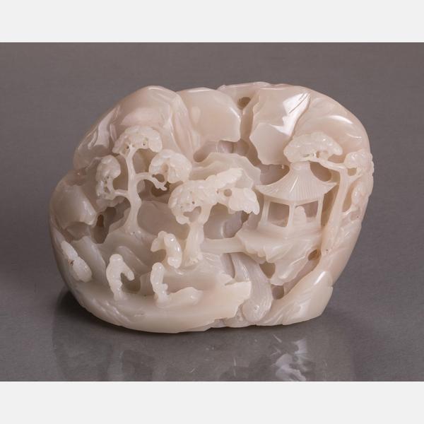 Lot 40 A Chinese Carved White Hetian Nephrite Jade Boulder