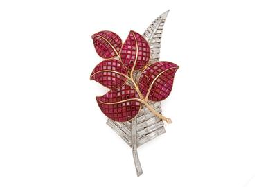 Lot 36: Van Cleef & Arpels Gold, Platinum, 'Mystery-Set' Ruby, and Diamond Leaf Brooch, SOLD $781,250