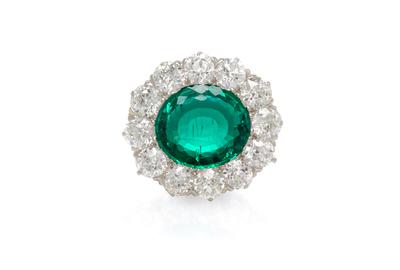 A Fine Platinum, Yellow Gold, Emerald and Diamond Brooch, Tiffany & Co.