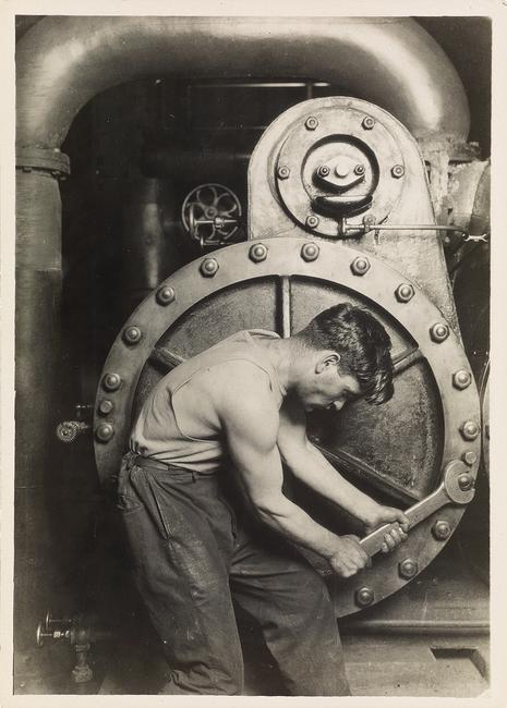 Lot 60: Lewis W.  Hine, Powerhouse Mechanic, silver print, circa 1921.  Estimate $70,000 to $100,000.