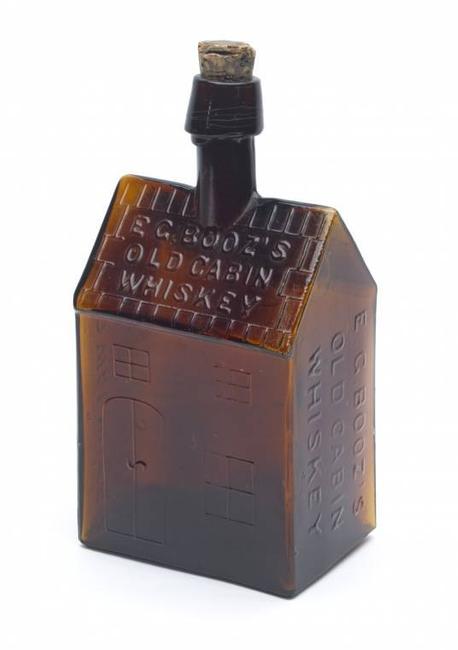 E.  G.  Booz's Old Cabin Whiskey figural bottle, made by Whitney Glass Works (Glassboro, N.J.), circa 1860-1880 ($4,388).