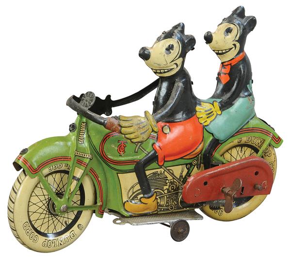 Circa-1932 Tippco (Germany) Mickey and Minnie Mouse motorcycle, tin wind-up, 9in long.  Provenance: Donald Kaufman collection, Doug and Pat Wengel collection.  Sold for $222,000, a world-record auction price for any Disney toy, against an estimate of $25,000-$45,000.  