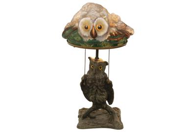 This Pairpoint Puffy “Owl” table lamp ($25/40,000) is reported to be one of only a few known examples.  It stands 21½ inches tall.