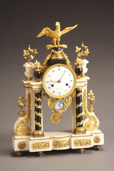 Louis XVI Ormolu Mounted Marble and Slate Mantel Clock ($7,000-$9,000)