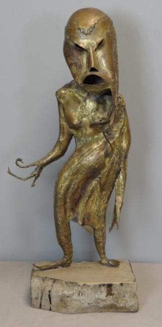 Reinhold brass sculpture entitled "Le Peril Blanc."