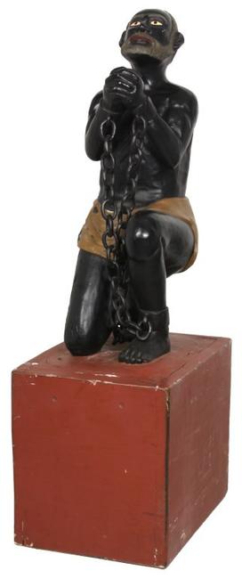 This figural carved wood slave trade abolition carving will be sold March 29 in Pittsfield, Mass.