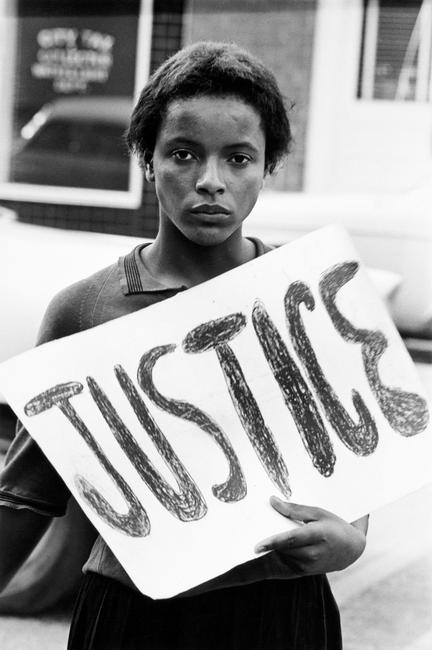 Declan Haun (American, b.  1937−1994) Picketing the Courthouse, Monroe, North Carolina, August 26, 1961, Gelatin silver print photograph).  Museum purchase, in memory of Alice R.  and Sol B.  Frank, and with funds provided by Patricia L.  Raymond, M.D.  