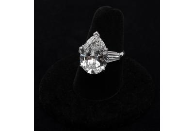 Lot 134: GIA certified 9.19 carat pear-shape diamond solitaire.  Estimate $75,000-100,000