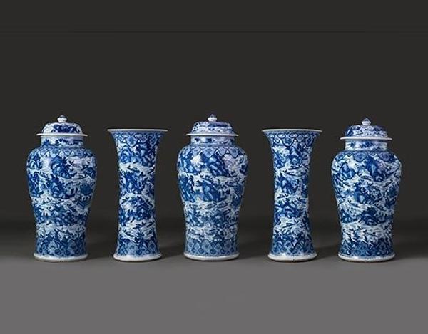 Garniture with scenes of West Lake, ca.  1700.  China, Qing dynasty (1644-1911).  Porcelain painted with cobalt blue under a transparent glaze; Jars, H.  40 3/4 in., Vases, H.  35 5/8 in.  R.  Albuquerque Collection