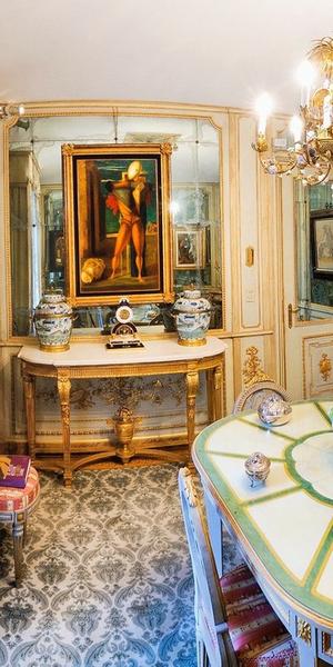 Dining room at Villa Cerruti, hung with paintings by Giorgio de Chirico, photo Gabriele Gaidano.  Courtesy Castello di Rivoli Museo d’Arte Contemporanea, Rivoli-Turin