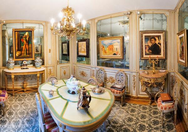 Dining room at Villa Cerruti, hung with paintings by Giorgio de Chirico, photo Gabriele Gaidano.  Courtesy Castello di Rivoli Museo d’Arte Contemporanea, Rivoli-Turin