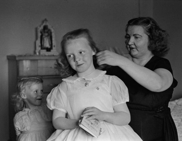 Larry Fink, First Communion, Bronx, NY, 1961, from the series Making Out 1957-1980, silver gelatin print, 54/75, 15 1/8 x 19 1/4 inches, Gift of Stephen L.  Singer and Linda G.  Singer, © Larry Fink.  