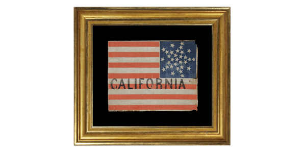 From Jeff R.  Bridgman, 31 stars arranged in a rare variation of the “great star” pattern, with the word "California" painted in the stripes, a pre-civil war flag, California statehood, 1850 - 1858, part of a series of these flags, thought to have been used at the Wigwam convention (the 1860 Republican national convention) in Chicago.